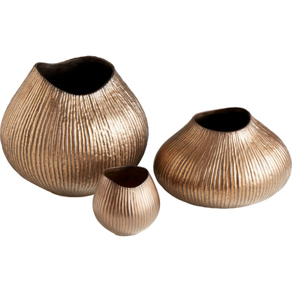 Arpeggi Candleholder by Cyan Design in gold. Made from ceramic in a eclectic & global style.