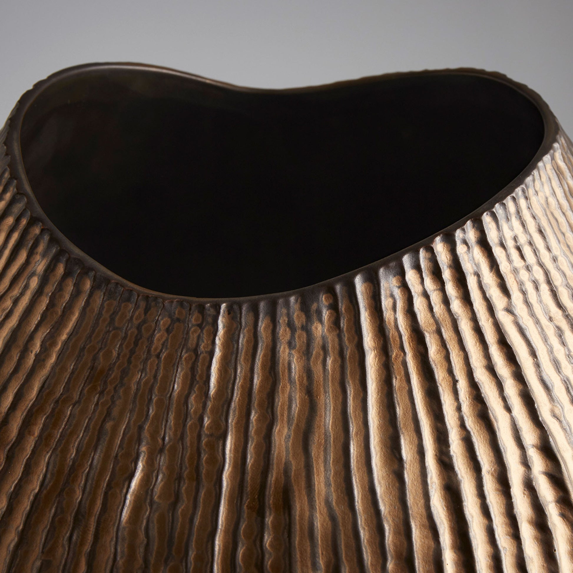 Arpeggi Candleholder by Cyan Design in gold. Made from ceramic in a eclectic & global style.