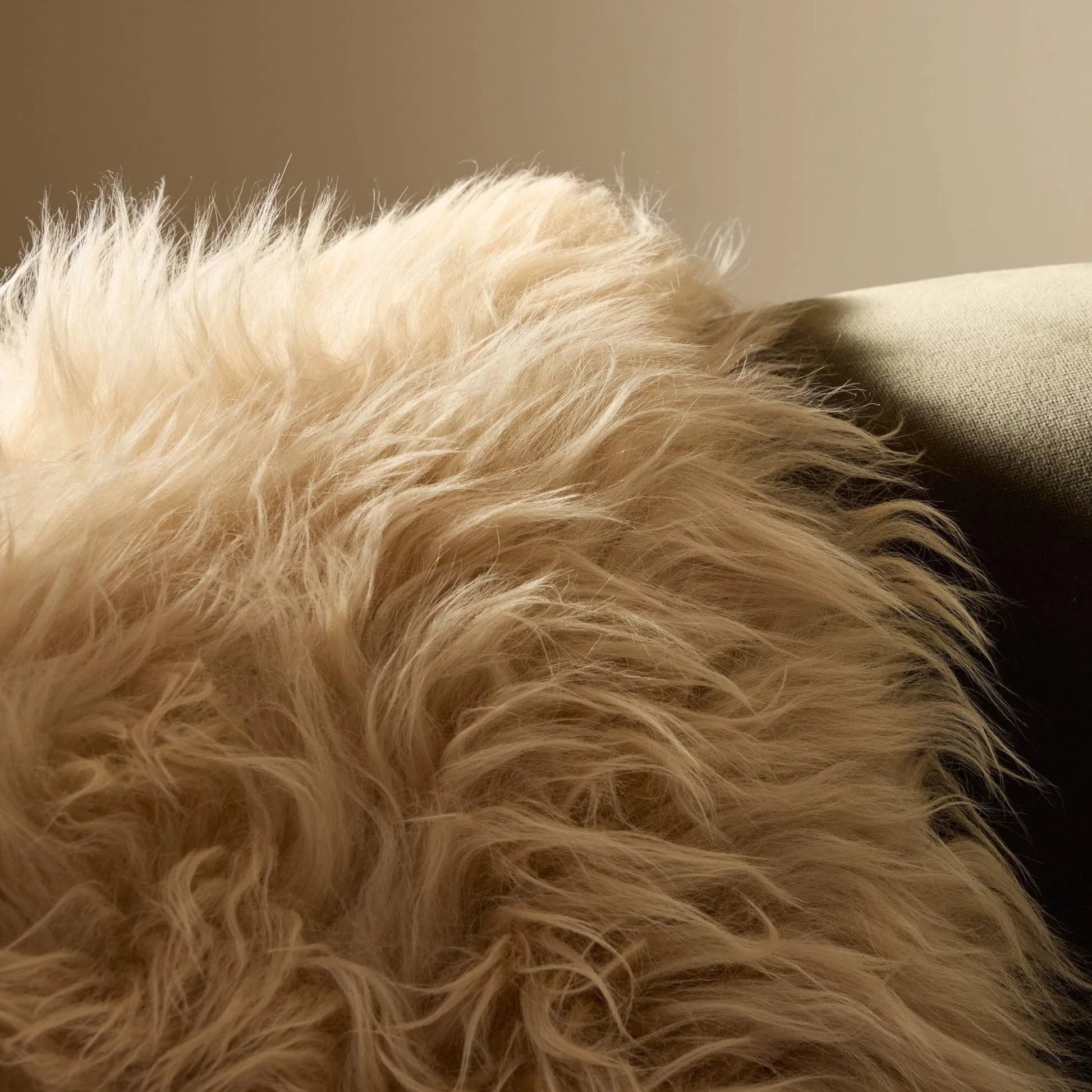 Lalo Lambskin Throw by Four Hands. Made from shearling in a rustic style.
