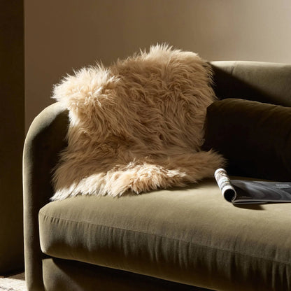 Lalo Lambskin Throw by Four Hands. Made from shearling in a rustic style.