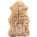 Lalo Lambskin Throw by Four Hands. Made from shearling in a rustic style.