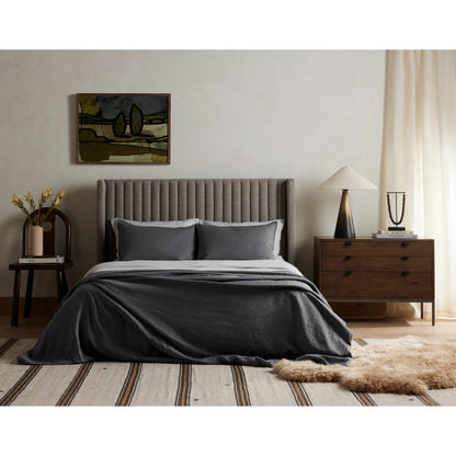 Lalo Lambskin Throw by Four Hands. Made from shearling in a rustic style.