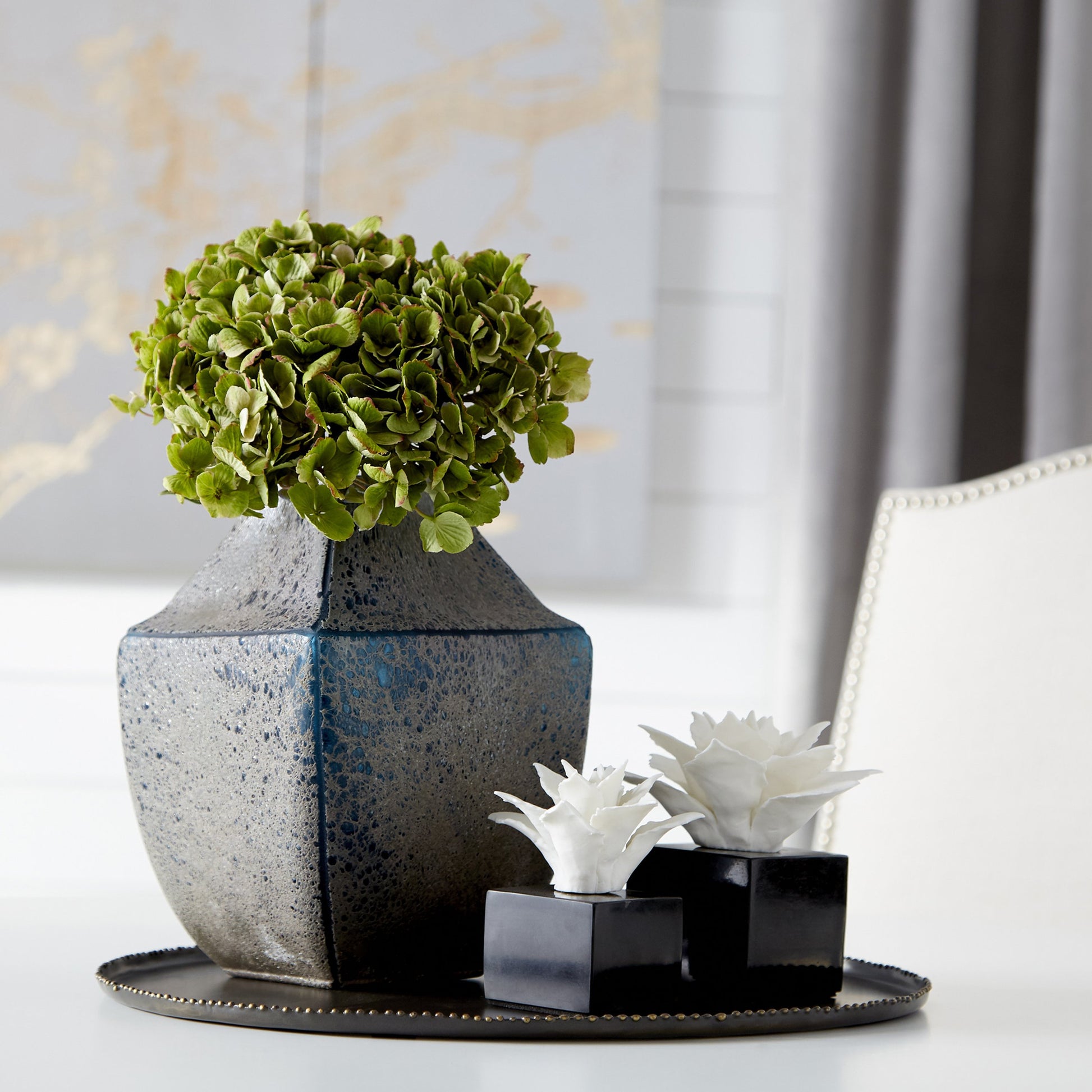 Calendine Sculpture by Cyan Design in white. Made from ceramic, marble in a modern style.