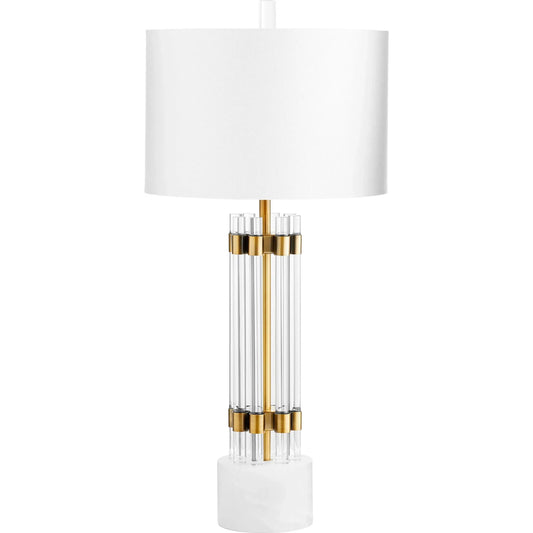 Kerberos Table Lamp by Cyan Design in brass. Made from glass, marble with off white linen shade in a transitional style.