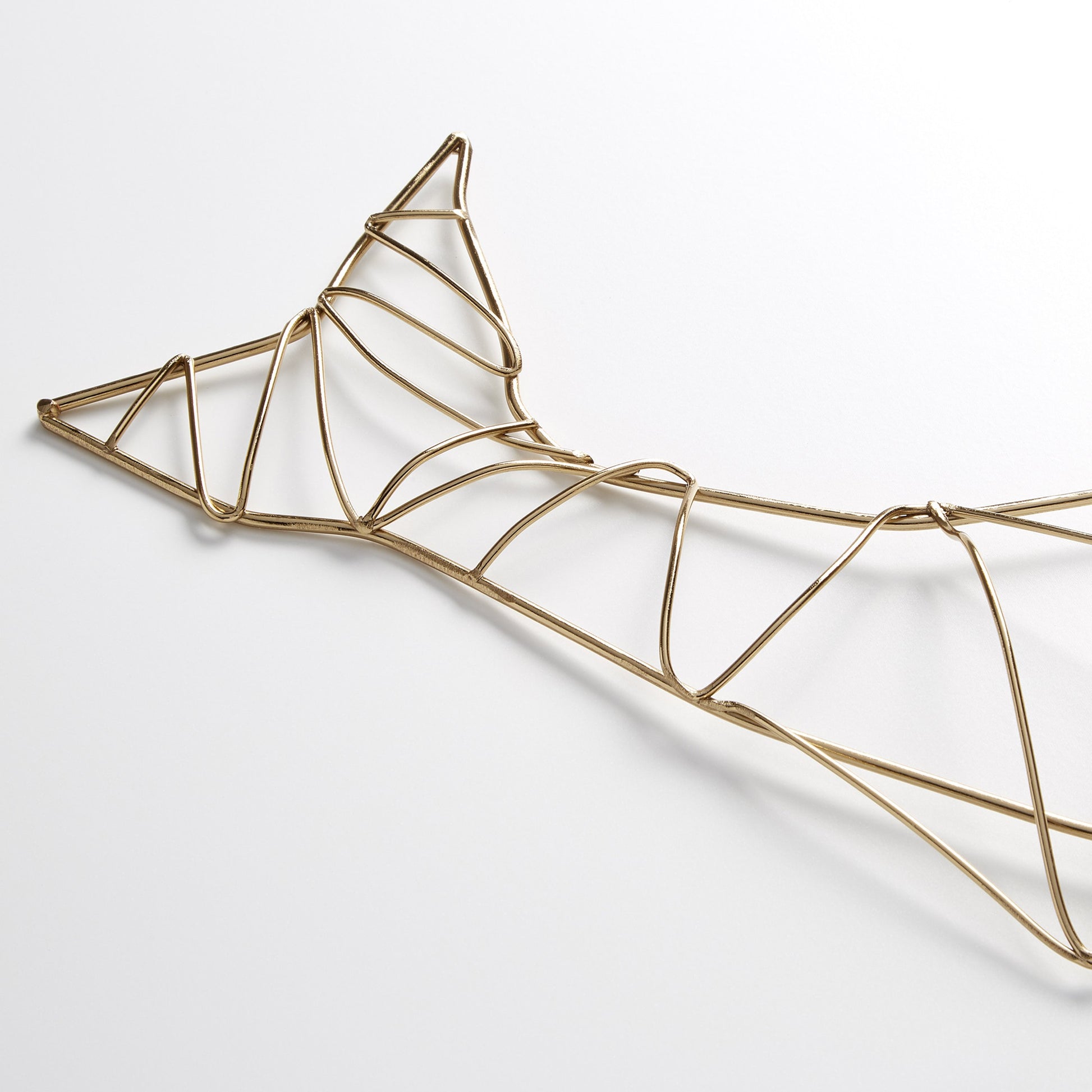 Humpback Wall Art by Cyan Design in gold. Made from iron in a coastal style.
