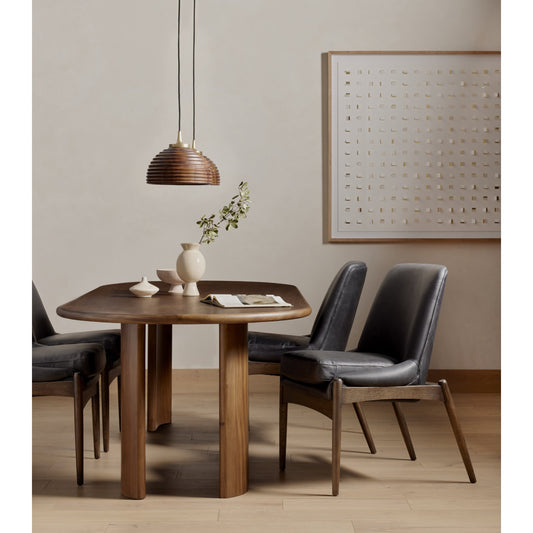 Lunas Oval Dining Table by Four Hands in caramel guanacaste. Made from thick guanacaste veneer in a rustic style.