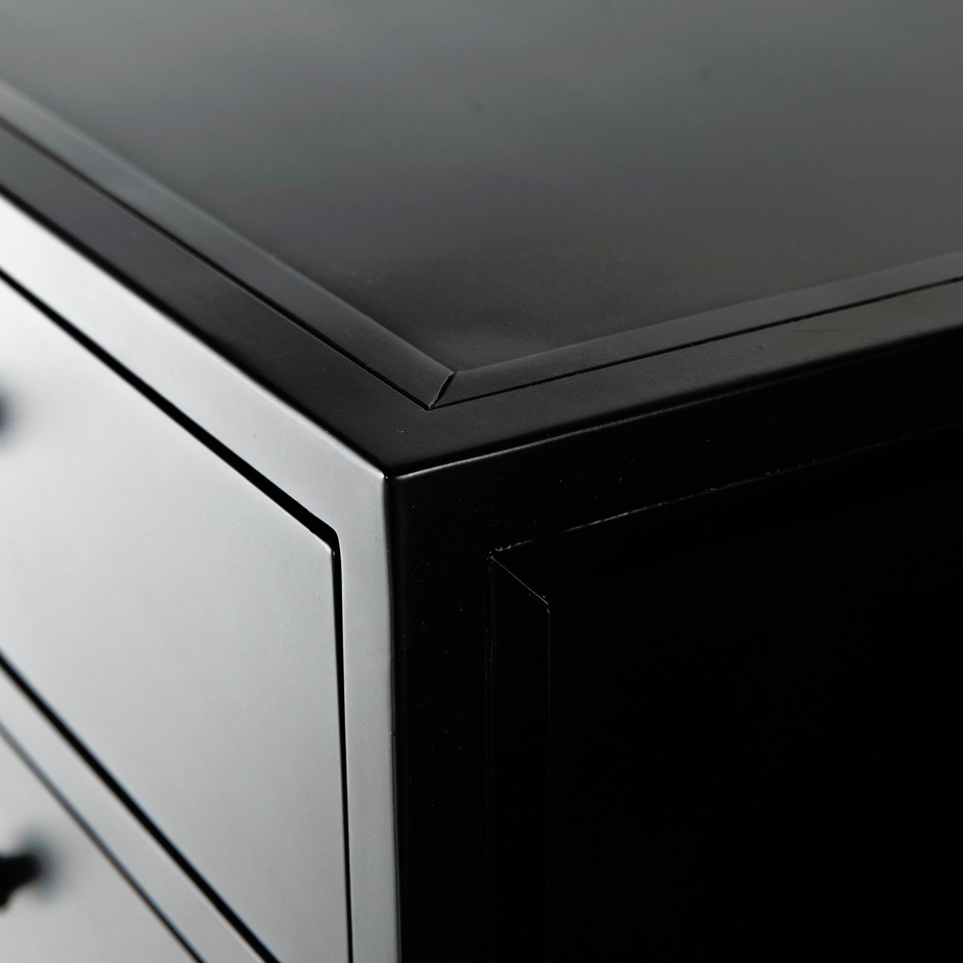 Belmont Tall Dresser by Four Hands in black. Made from iron in a transitional style.