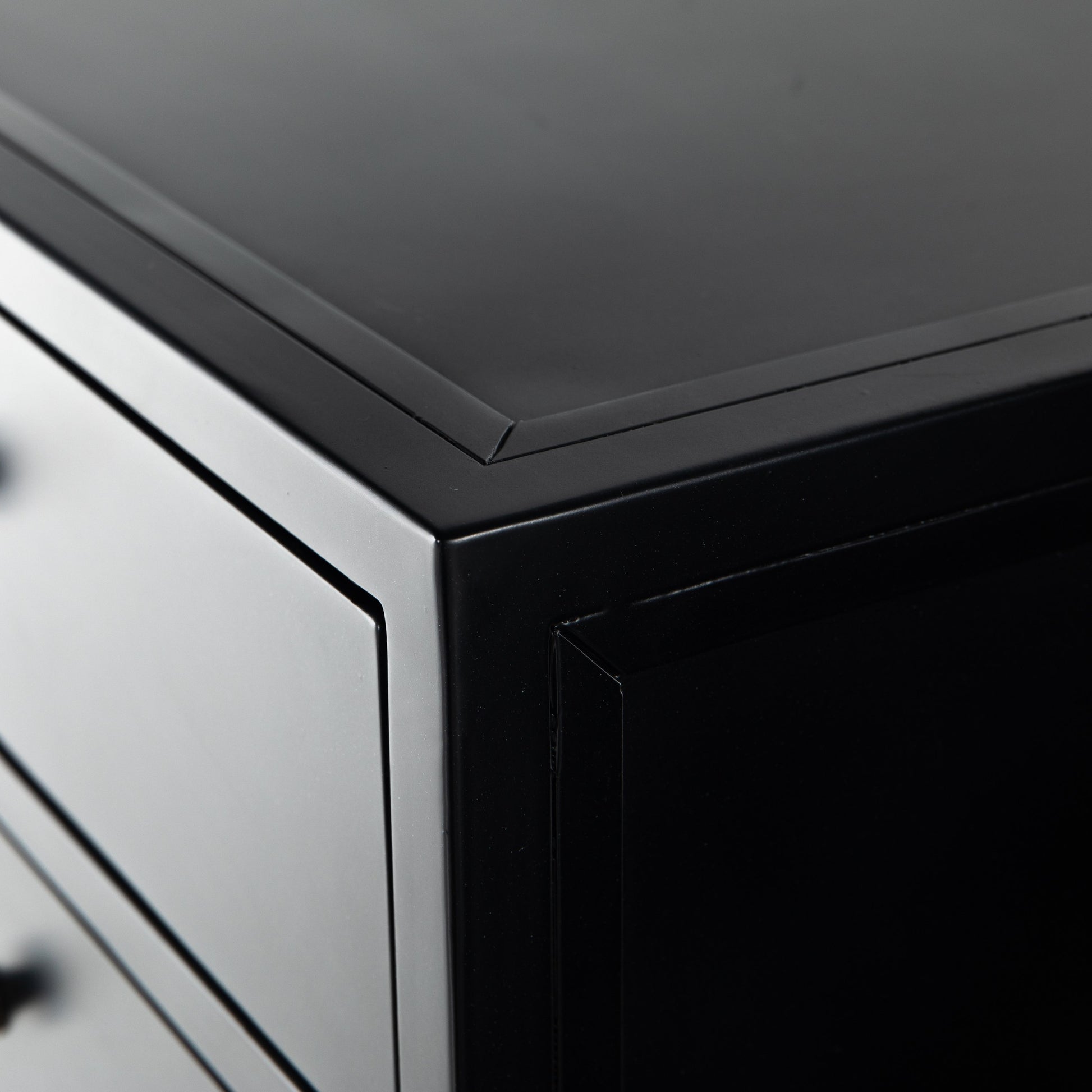 Belmont Tall Dresser by Four Hands in black. Made from iron in a transitional style.