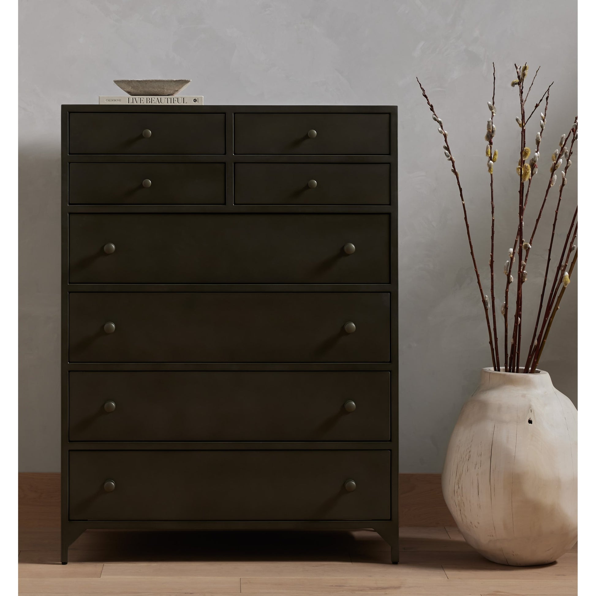 Belmont Tall Dresser by Four Hands in black. Made from iron in a transitional style.