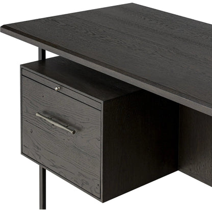 Lauren Desk by Four Hands in charcoal oak resawn veneer, black and silver metal, charcoal oak veneer. Made from resawn oak, iron, oak veneer in a unique style.