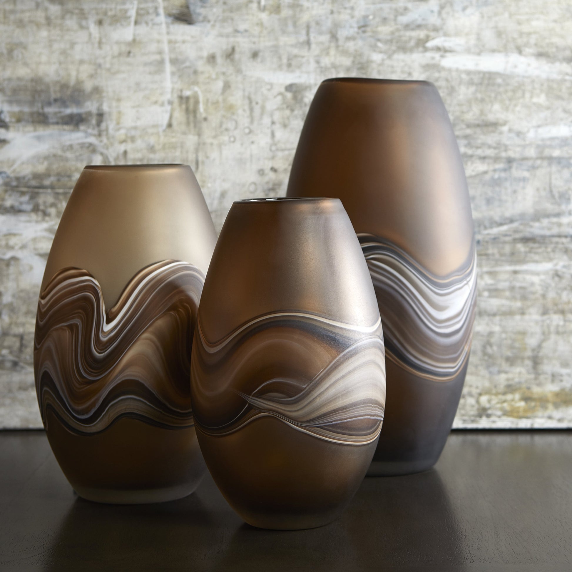 Nina Vase by Cyan Design in amber swirl. Made from glass in a modern style.