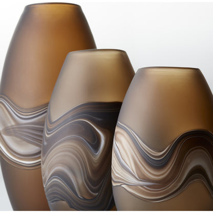 Nina Vase by Cyan Design in amber swirl. Made from glass in a modern style.