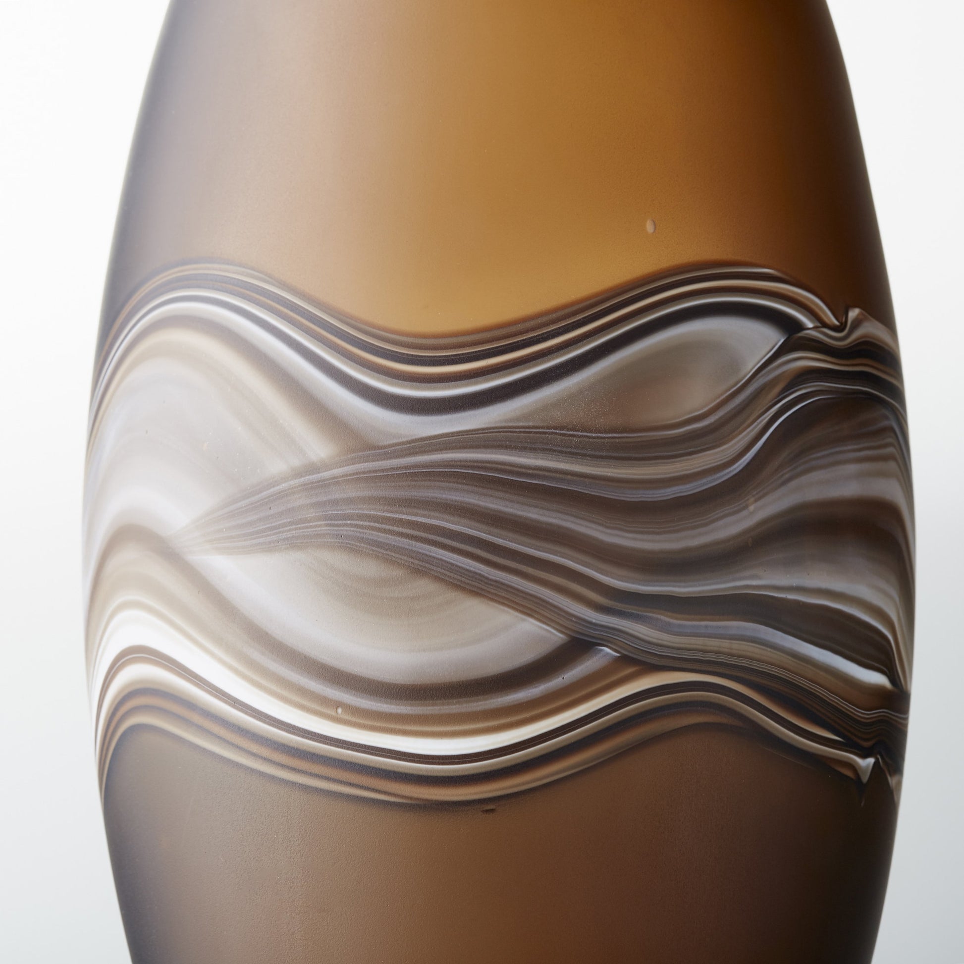 Nina Vase by Cyan Design in amber swirl. Made from glass in a modern style.