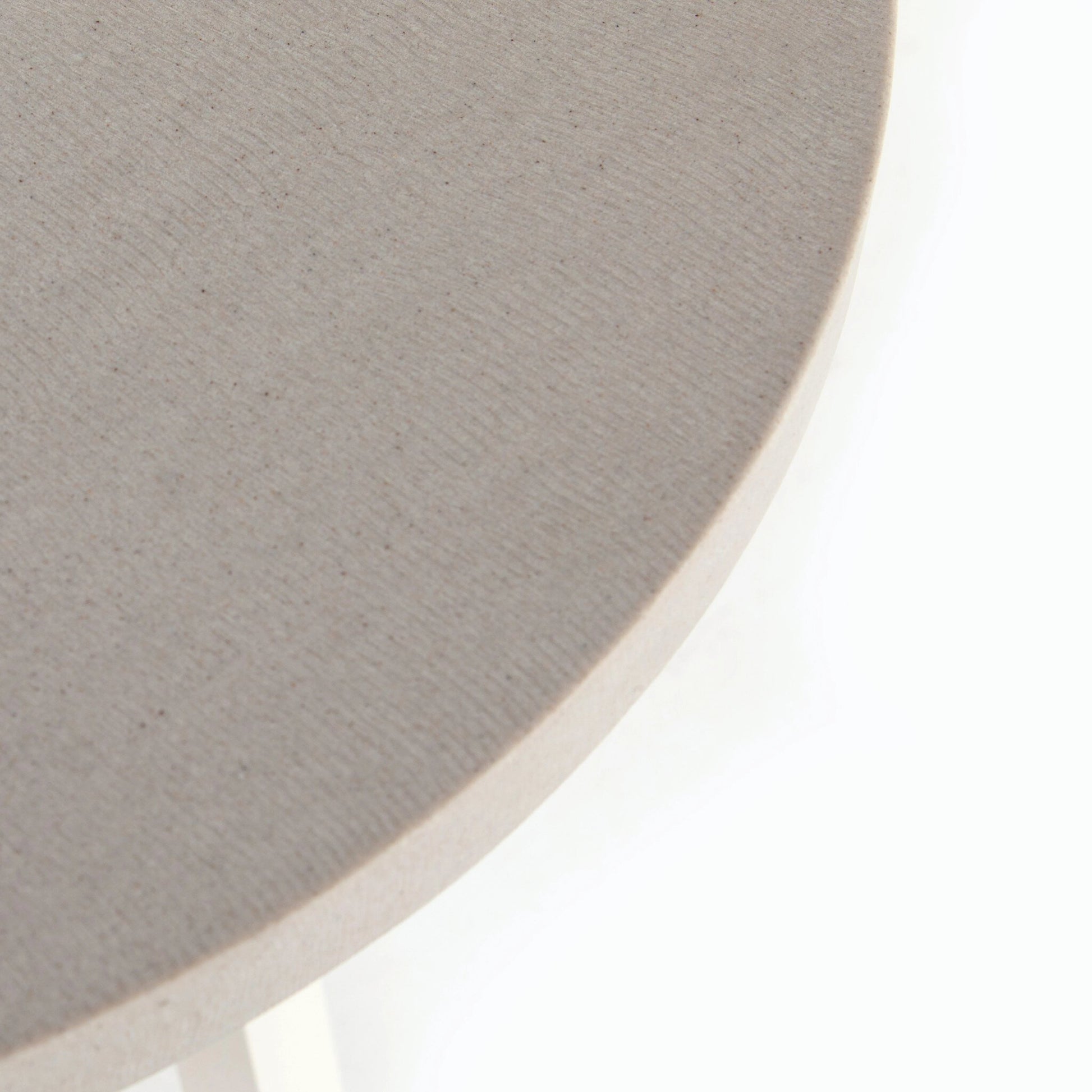 Cyrus Outdoor Round Dining Table by Four Hands. Made from lavastone composite, iron in a modern style.