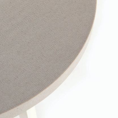 Cyrus Outdoor Round Dining Table by Four Hands. Made from lavastone composite, iron in a modern style.