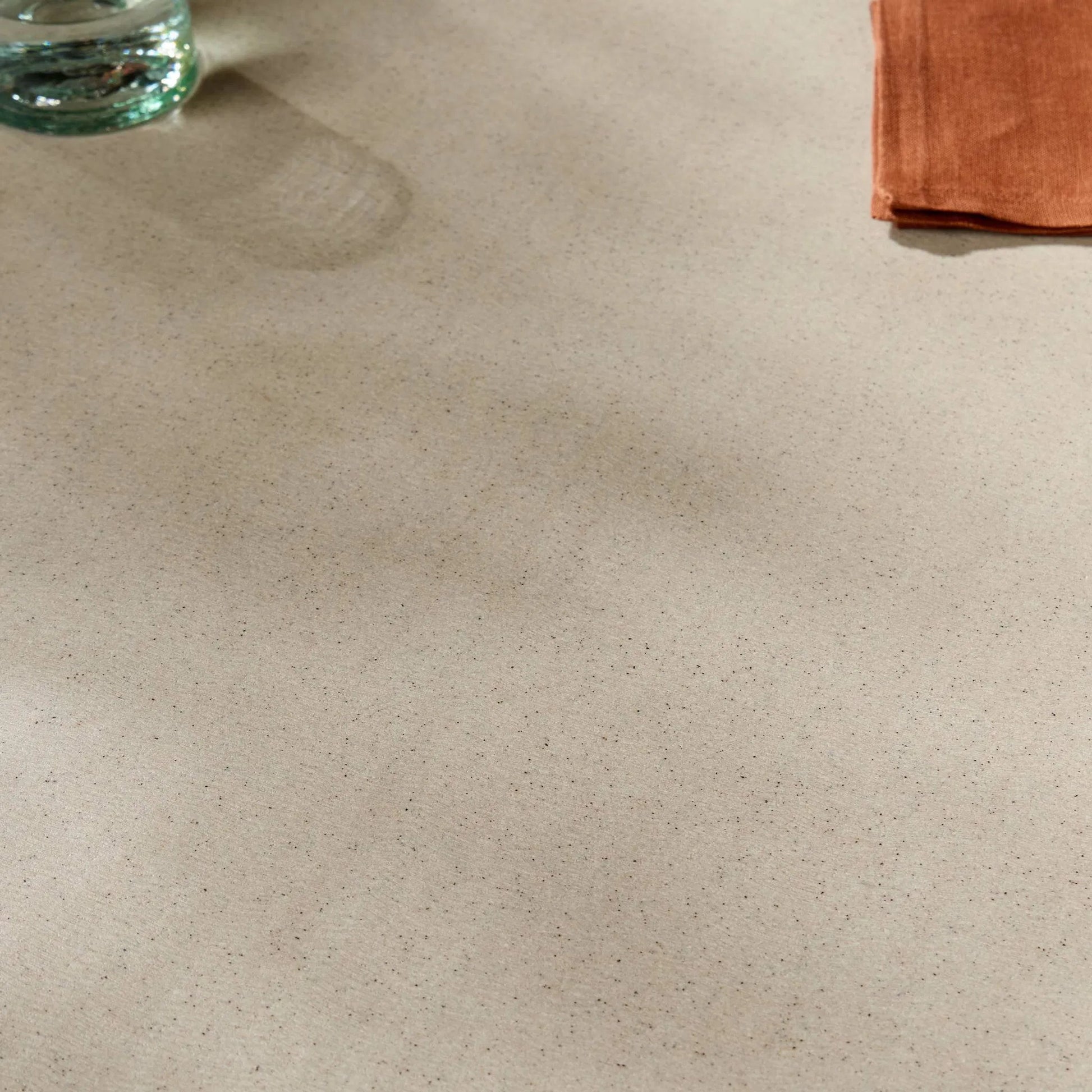 Cyrus Outdoor Round Dining Table by Four Hands. Made from lavastone composite, iron in a modern style.