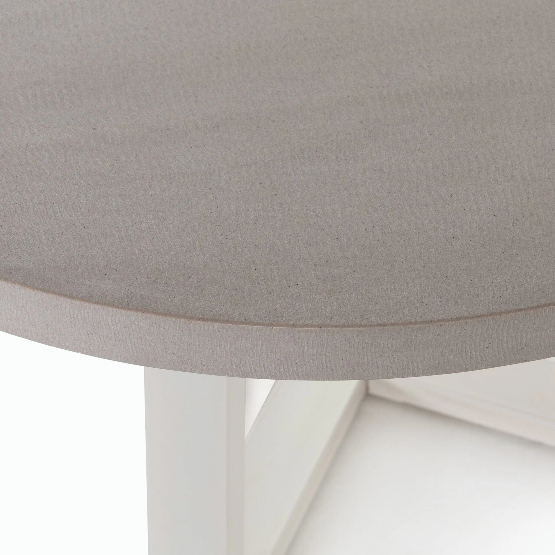 Cyrus Outdoor Round Dining Table by Four Hands. Made from lavastone composite, iron in a modern style.