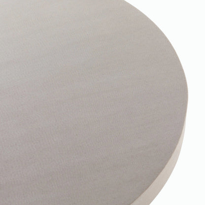 Cyrus Outdoor Round Dining Table by Four Hands. Made from lavastone composite, iron in a modern style.