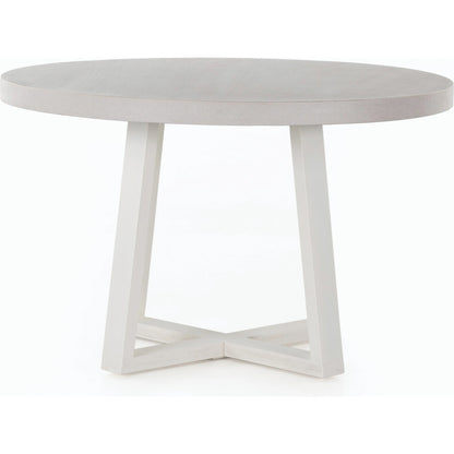 Cyrus Outdoor Round Dining Table by Four Hands. Made from lavastone composite, iron in a modern style.