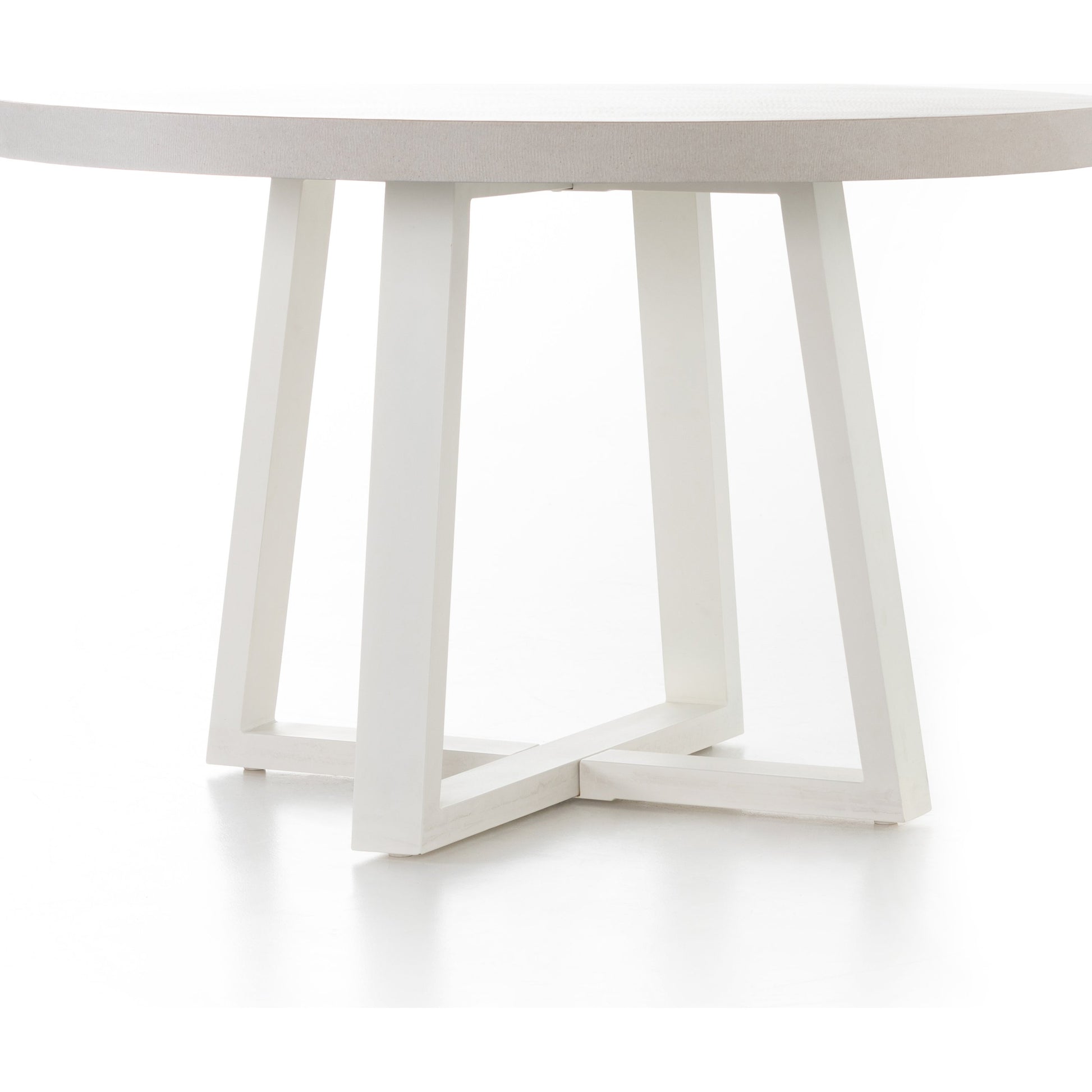 Cyrus Outdoor Round Dining Table by Four Hands. Made from lavastone composite, iron in a modern style.