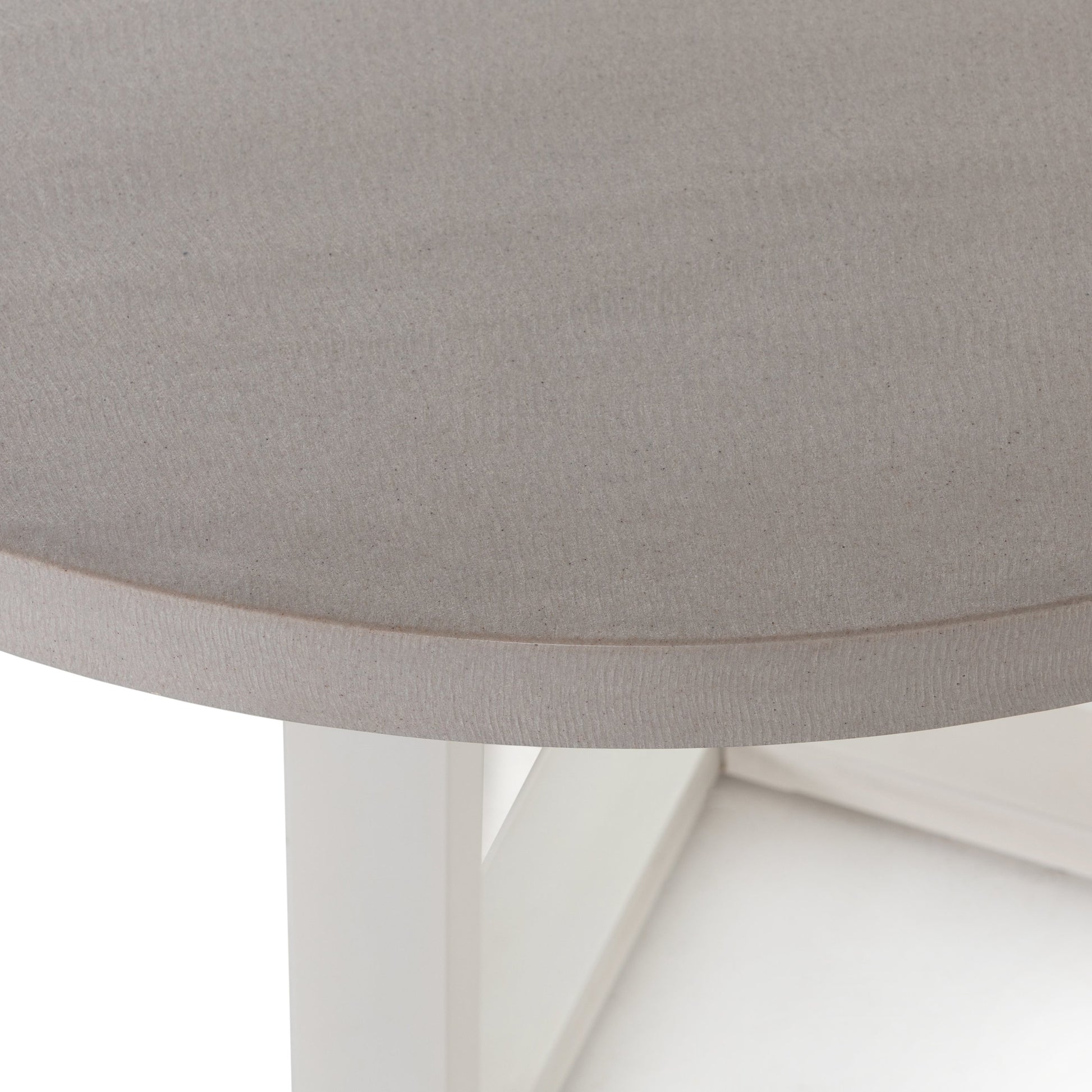 Cyrus Outdoor Round Dining Table by Four Hands. Made from lavastone composite, iron in a modern style.