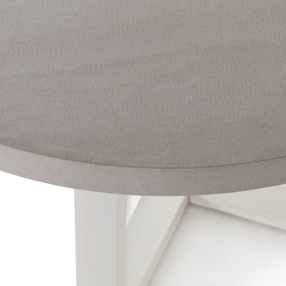 Cyrus Outdoor Round Dining Table by Four Hands. Made from lavastone composite, iron in a modern style.