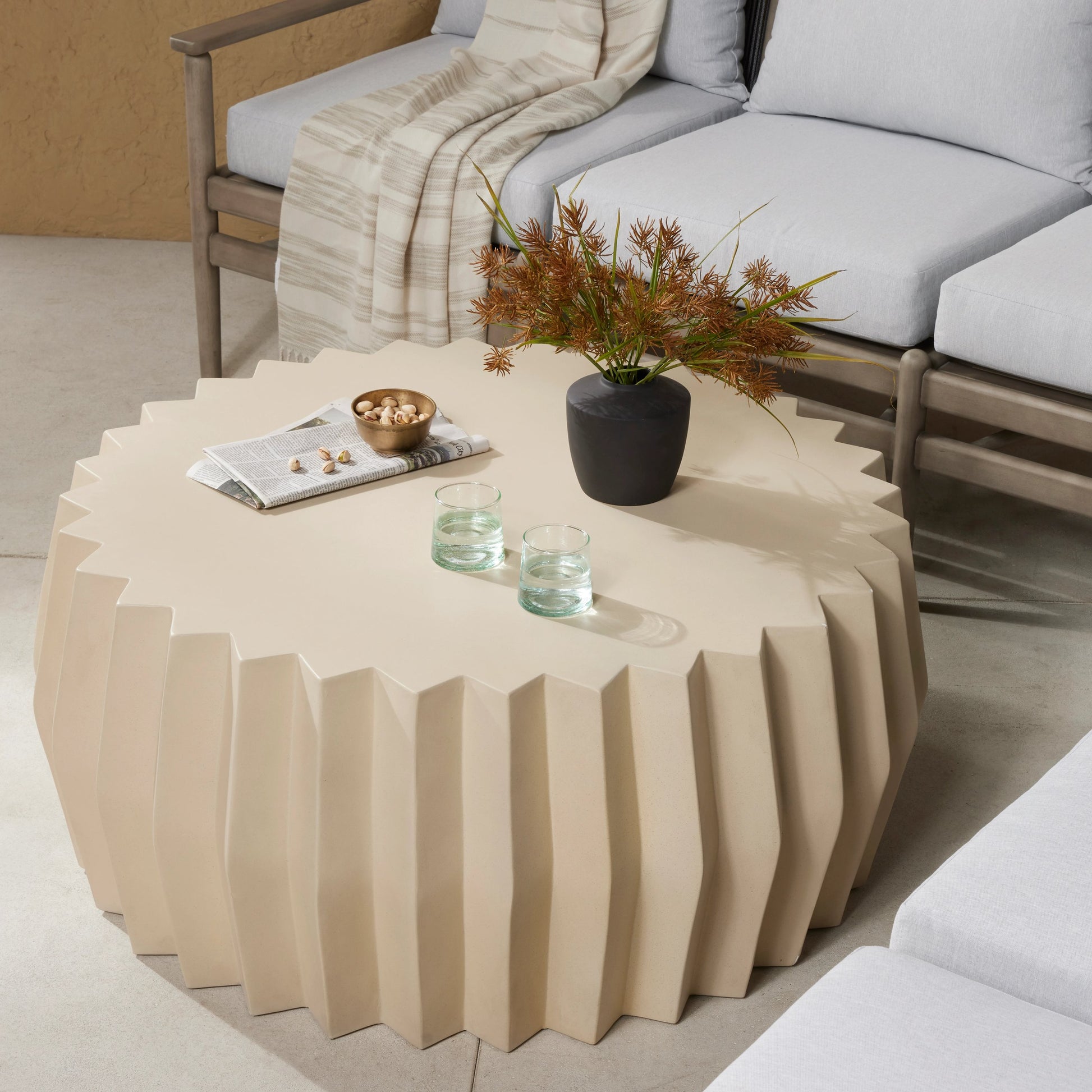 Gem Outdoor Coffee Table by Four Hands. Made from concrete in a modern style.