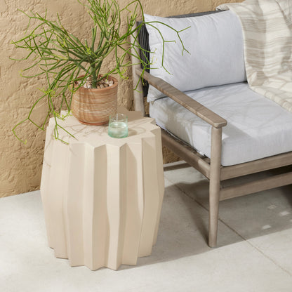 Gem Outdoor End Table by Four Hands. Made from concrete in a modern style.