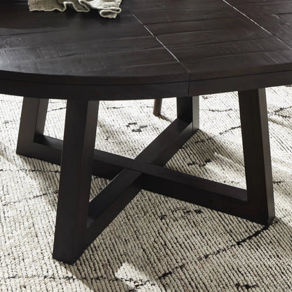Eberwin Round Ext Dining Table by Four Hands in dark carbon. Made from solid reclaimed pine in a modern style.