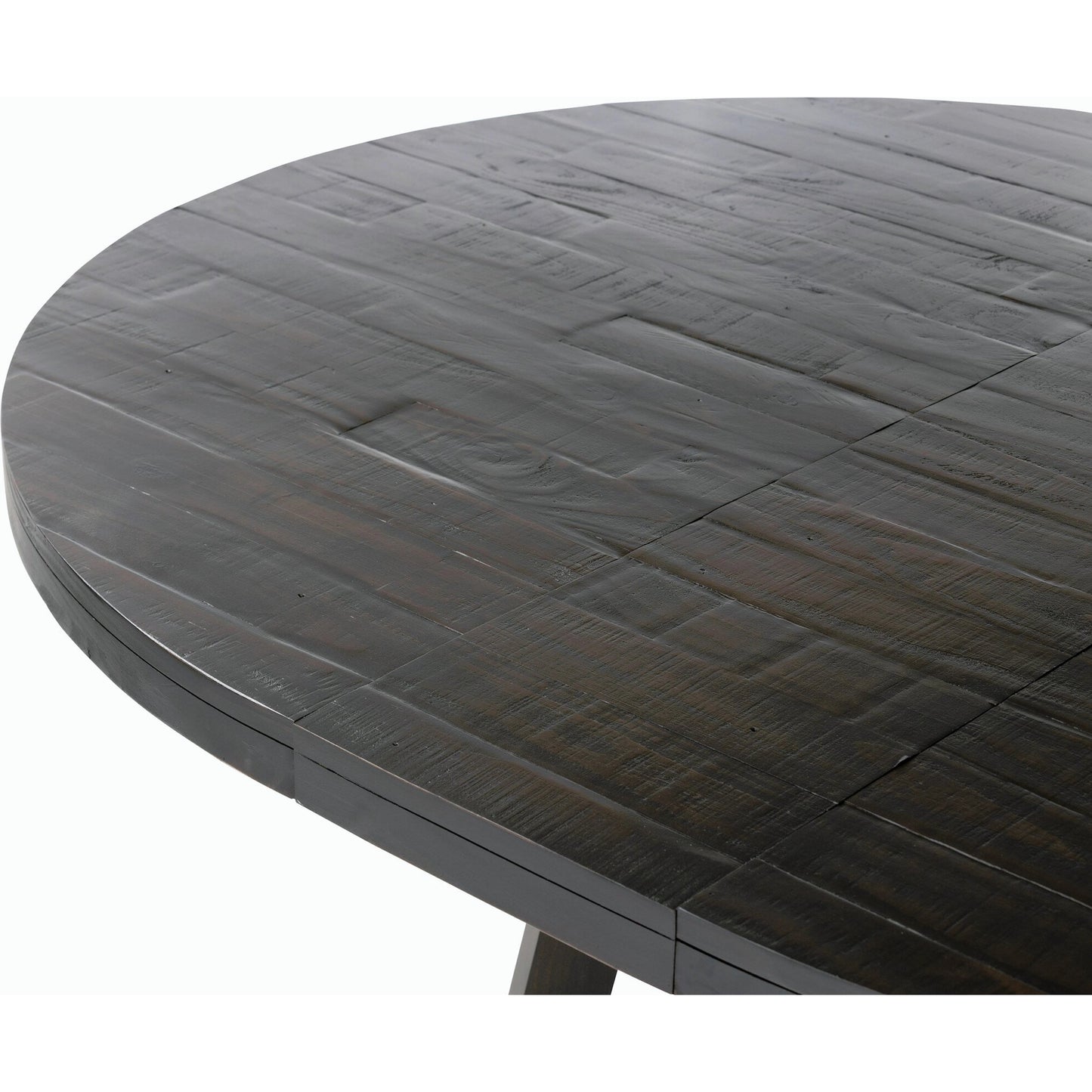 007 SI-2158148 | Closeup | Eberwin Round Ext Dining Table by Four Hands in dark carbon. Made from solid reclaimed pine in a modern style.
