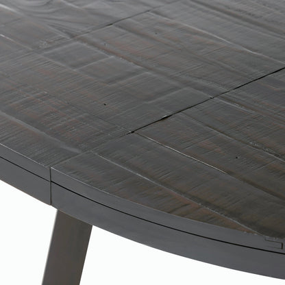 Eberwin Round Ext Dining Table by Four Hands in dark carbon. Made from solid reclaimed pine in a modern style.