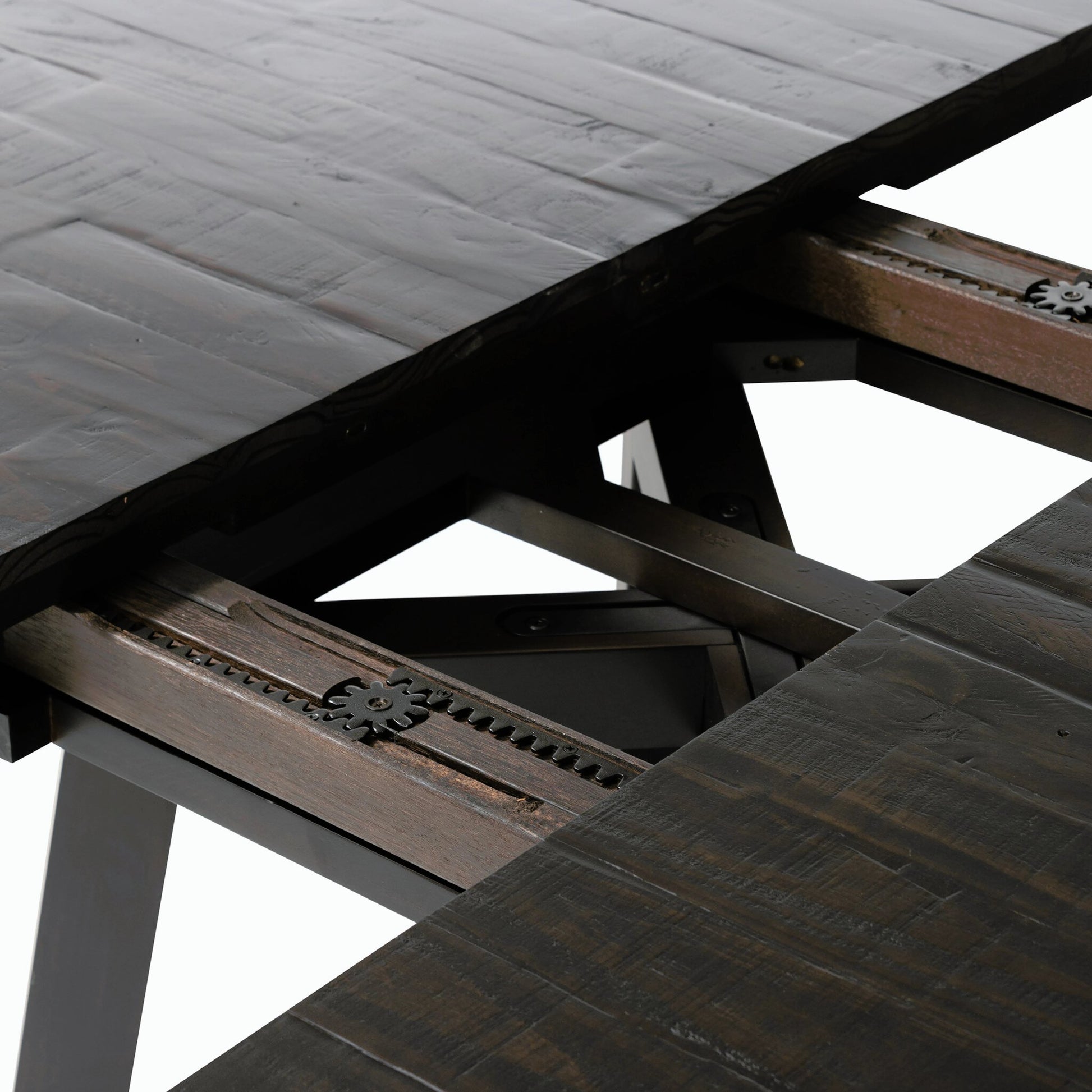 Eberwin Round Ext Dining Table by Four Hands in dark carbon. Made from solid reclaimed pine in a modern style.
