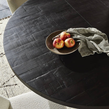 Eberwin Round Ext Dining Table by Four Hands in dark carbon. Made from solid reclaimed pine in a modern style.