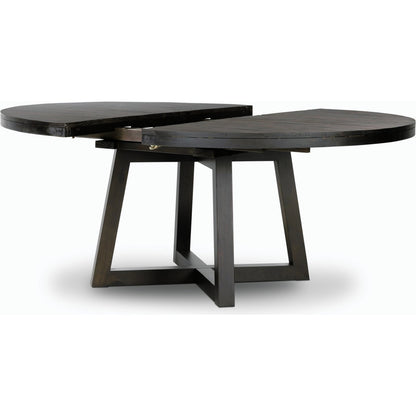 Eberwin Round Ext Dining Table by Four Hands in dark carbon. Made from solid reclaimed pine in a modern style.