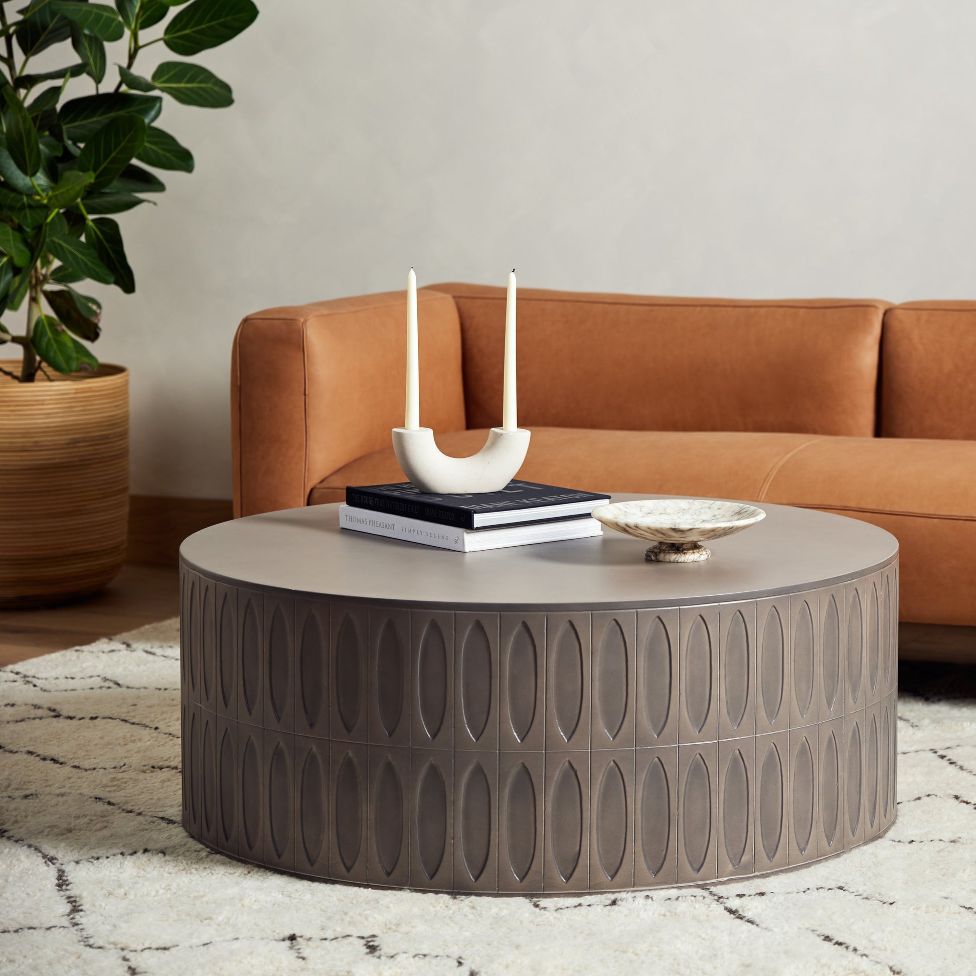 Colorado Drum Coffee Table by Four Hands in grey concrete and dark gray. Made from concrete in a eclectic & global style.