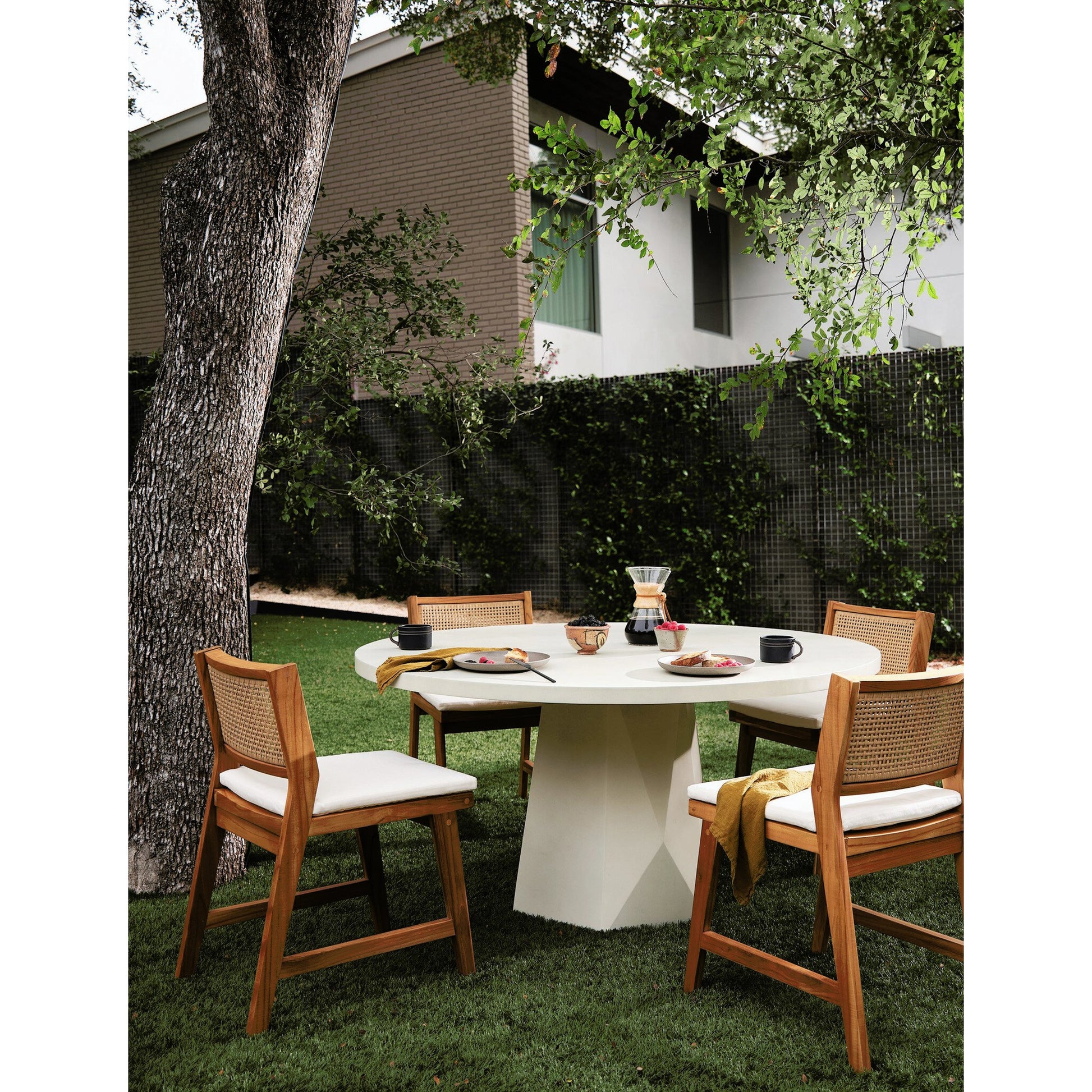 Bowman Outdoor Dining Table by Four Hands. Made from unique in a modern style.