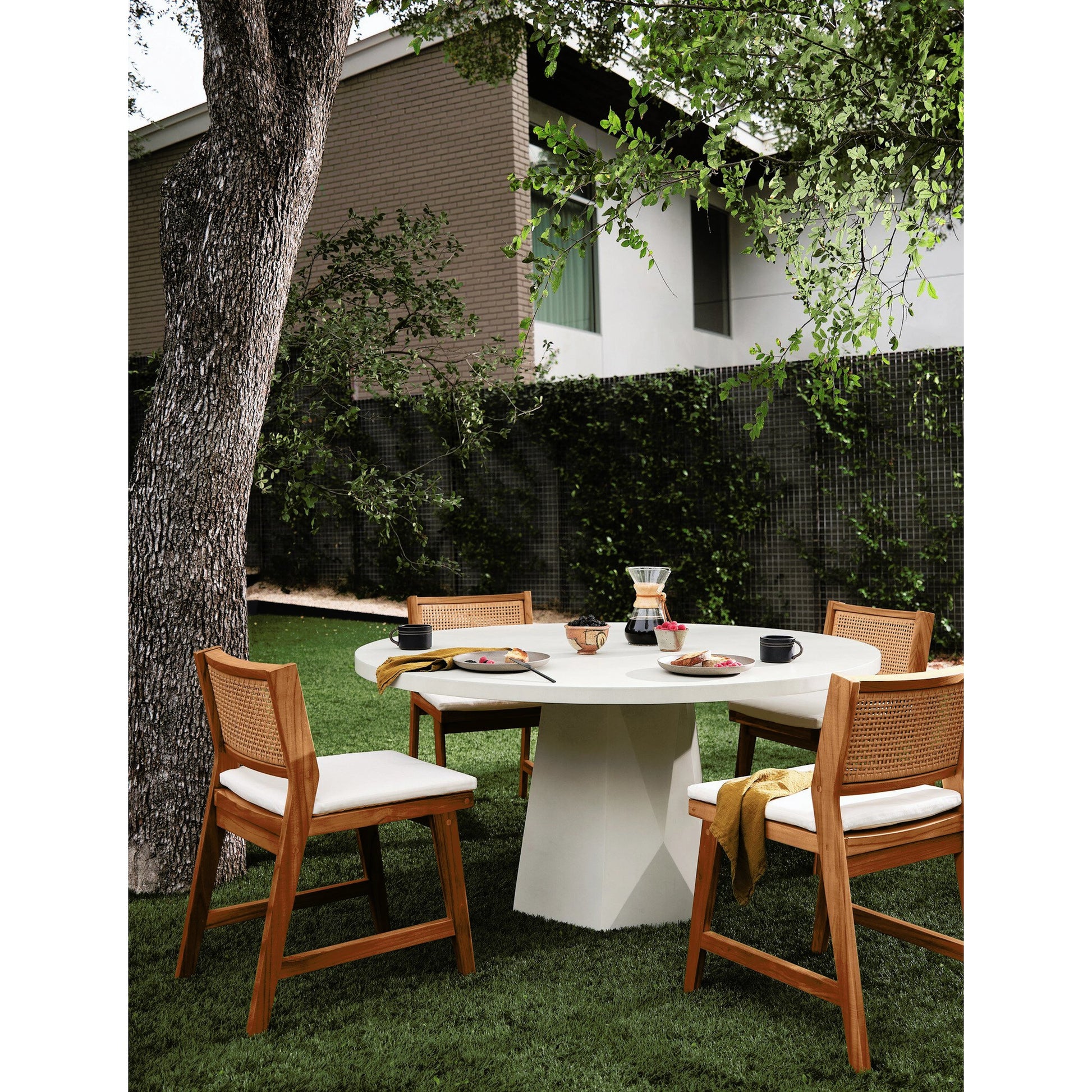 Bowman Outdoor Dining Table by Four Hands. Made from unique in a modern style.