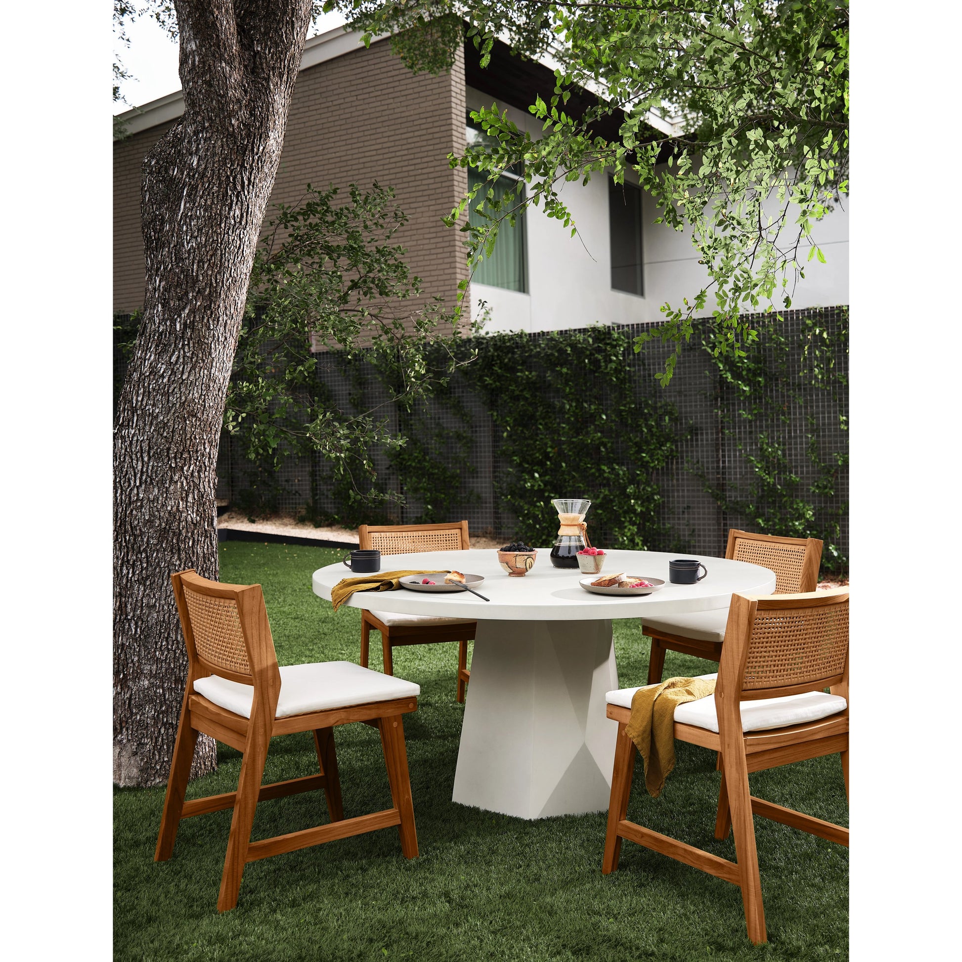 Bowman Outdoor Dining Table by Four Hands. Made from unique in a modern style.