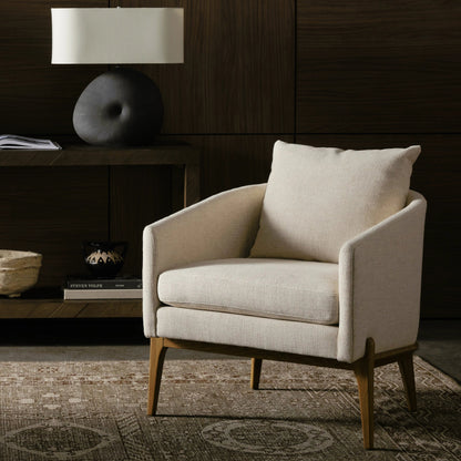 Copeland Chair by Four Hands in orly natural and black oak. Made from 100% polyester, solid oak in a transitional style.