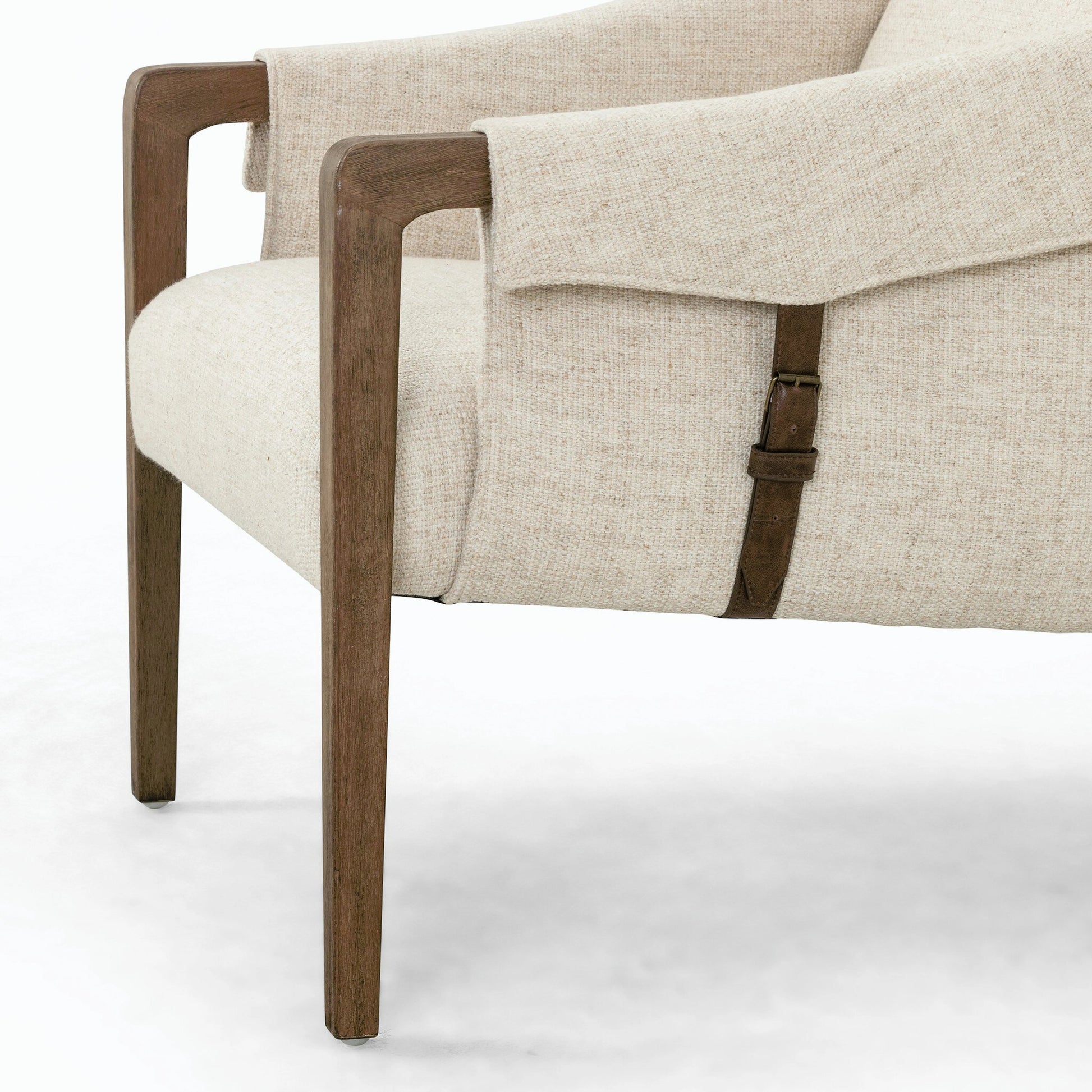 Bauer Chair by Four Hands in thames cream and distressed natural. Made from 66% polyester, 19% acrylic, 15% flax, linen, solid parawood, top grain leather in a modern style.
