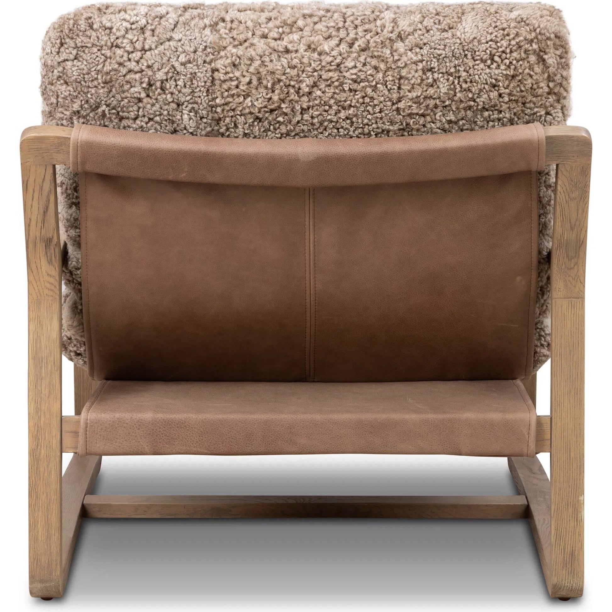 Shearling Ace Chair by Four Hands in taupe shearling, drifted oak, palermo cigar. Made from shearling, solid oak, top grain leather in a unique style.