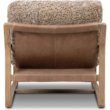 Shearling Ace Chair by Four Hands in taupe shearling, drifted oak, palermo cigar. Made from shearling, solid oak, top grain leather in a unique style.