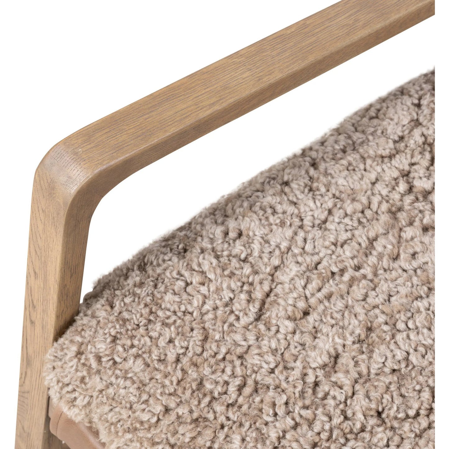 009 SI-2534739 | Closeup | Shearling Ace Chair by Four Hands in taupe shearling, drifted oak, palermo cigar. Made from shearling, solid oak, top grain leather in a unique style.