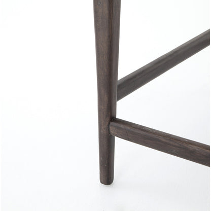 Tyler Counter Stool by Four Hands in chaps ebony, burnt oak. Made from top grain leather, solid nettlewood, 100% polyester in a modern style.
