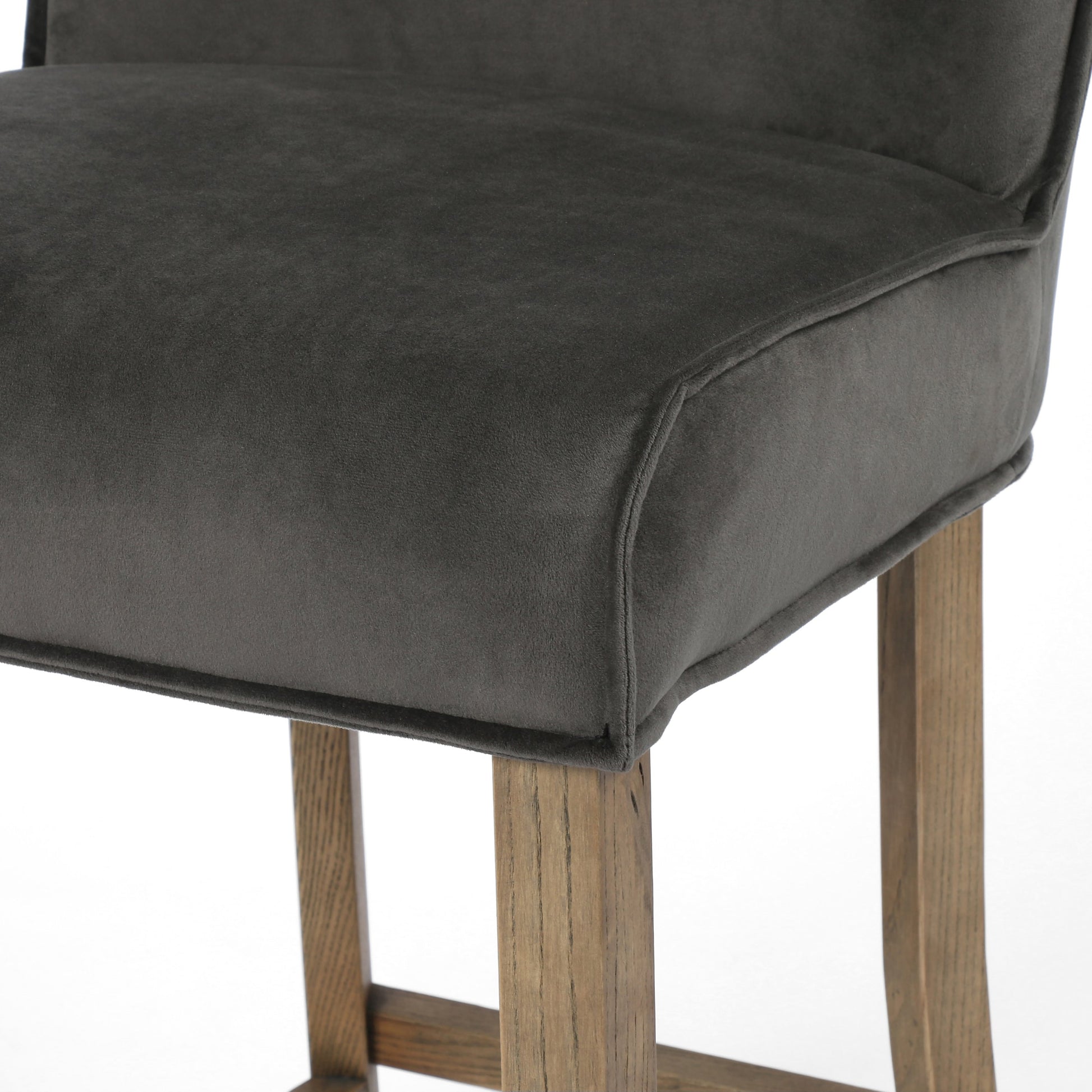 Aria Counter Stool by Four Hands in sienna chestnut. Made from top grain leather, solid nettlewood, 100% polyester in a modern style.