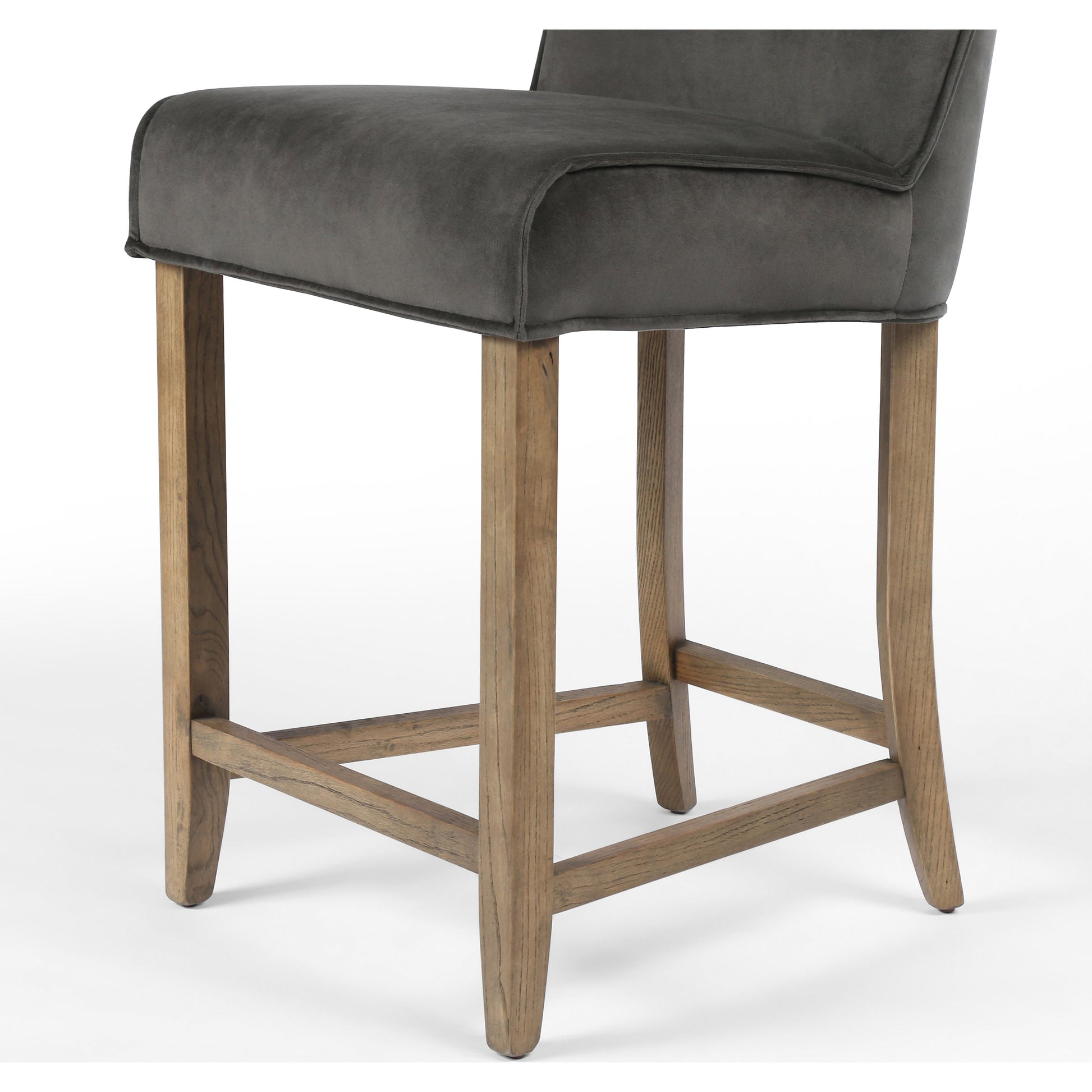 Aria Counter Stool by Four Hands in sienna chestnut. Made from top grain leather, solid nettlewood, 100% polyester in a modern style.