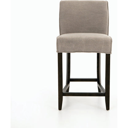 Aria Counter Stool by Four Hands in sienna chestnut. Made from top grain leather, solid nettlewood, 100% polyester in a modern style.