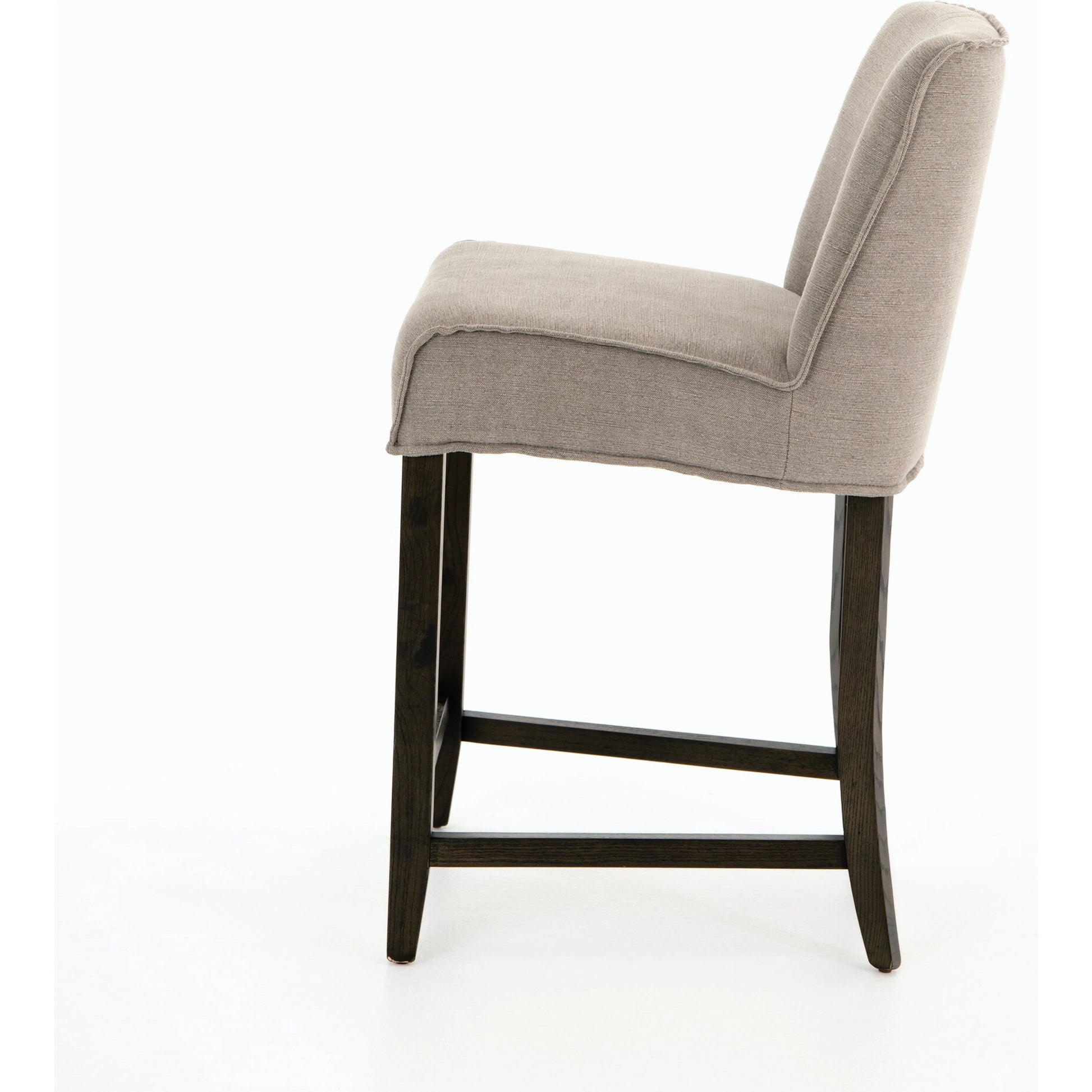 Aria Counter Stool by Four Hands in sienna chestnut. Made from top grain leather, solid nettlewood, 100% polyester in a modern style.