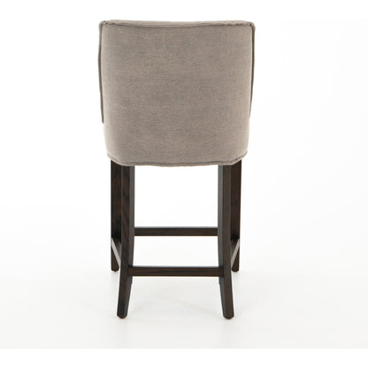 Aria Counter Stool by Four Hands in sienna chestnut. Made from top grain leather, solid nettlewood, 100% polyester in a modern style.