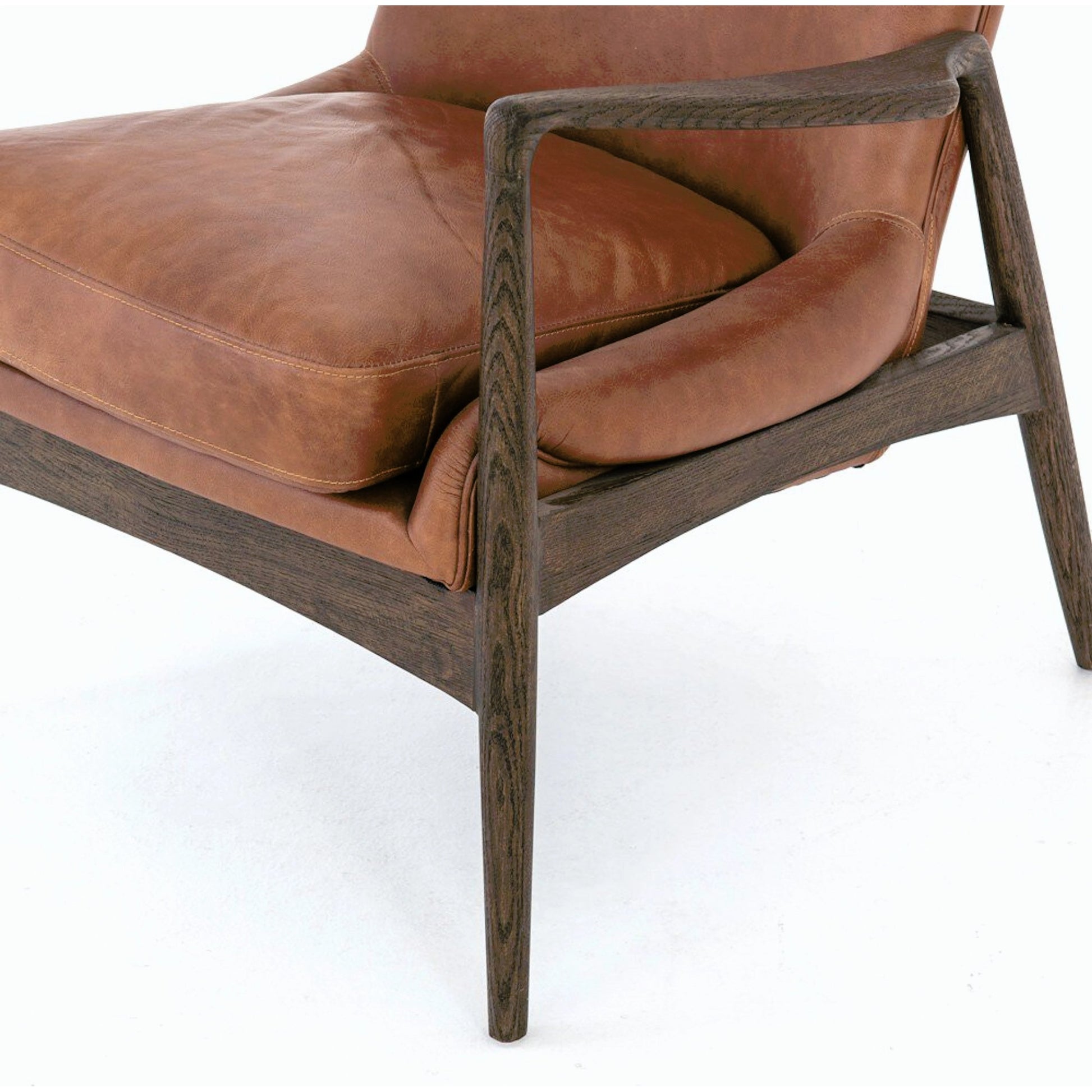 Braden Chair by Four Hands. Made from top grain leather, solid oak, 100% polyester in a modern style.